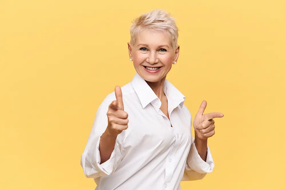 Retired man with grey beard showing off his big smile after Beverly Hills Ortho Treatment