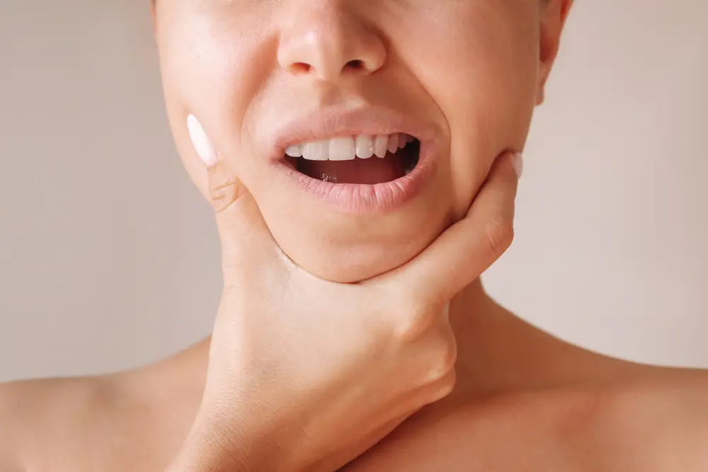 Teenage girl in braces poses for a portrait in Los Angeles