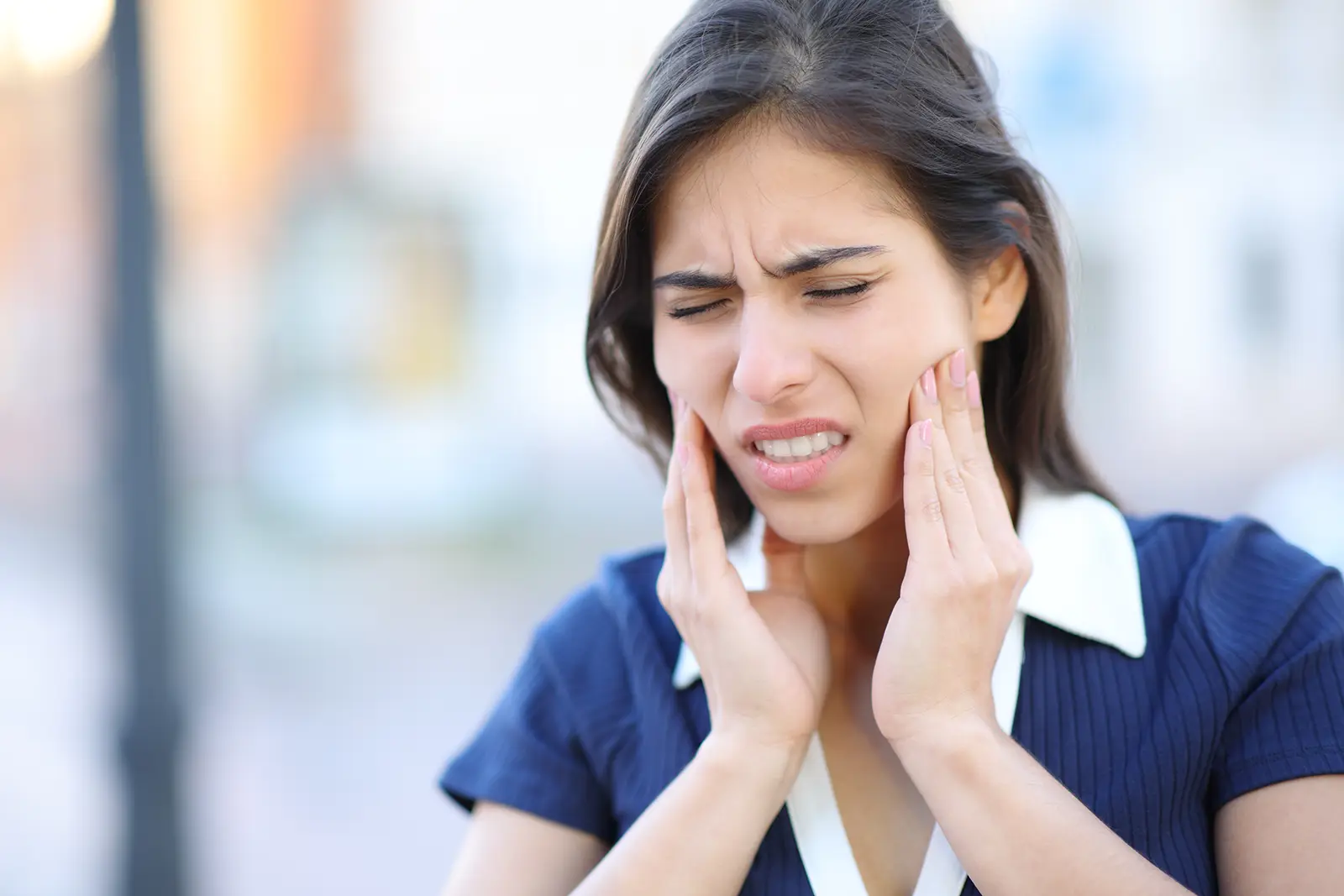 Transparent face showing xray of an orthodontic patient's lower jaw to treat TMJ pain 